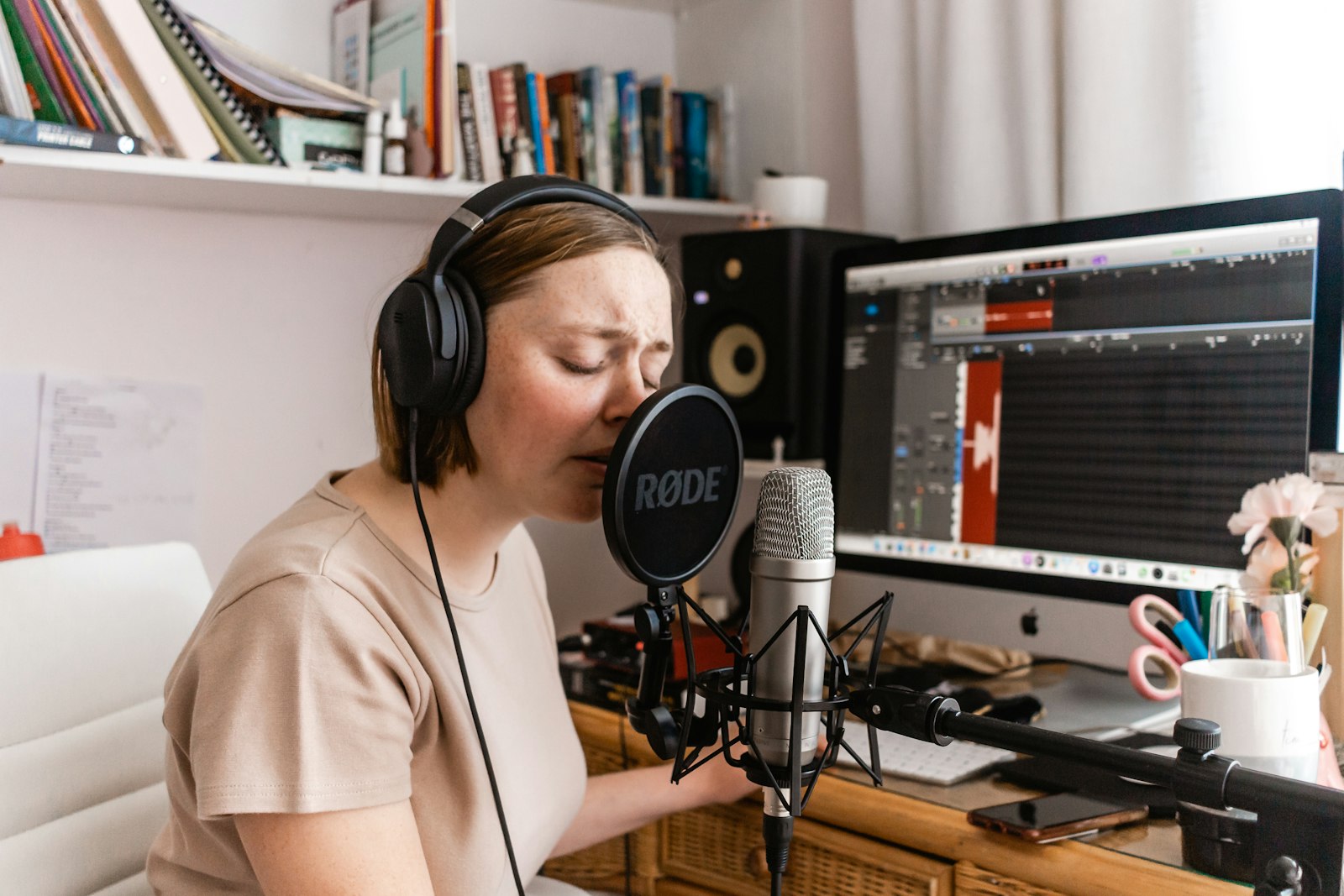 Person at a desk in a music studio