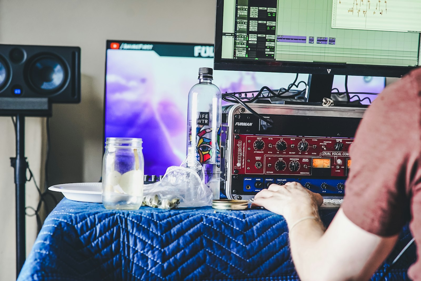 Person at a computer working on audio production