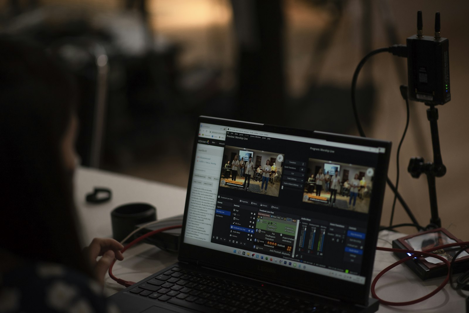 A person streaming live from a laptop